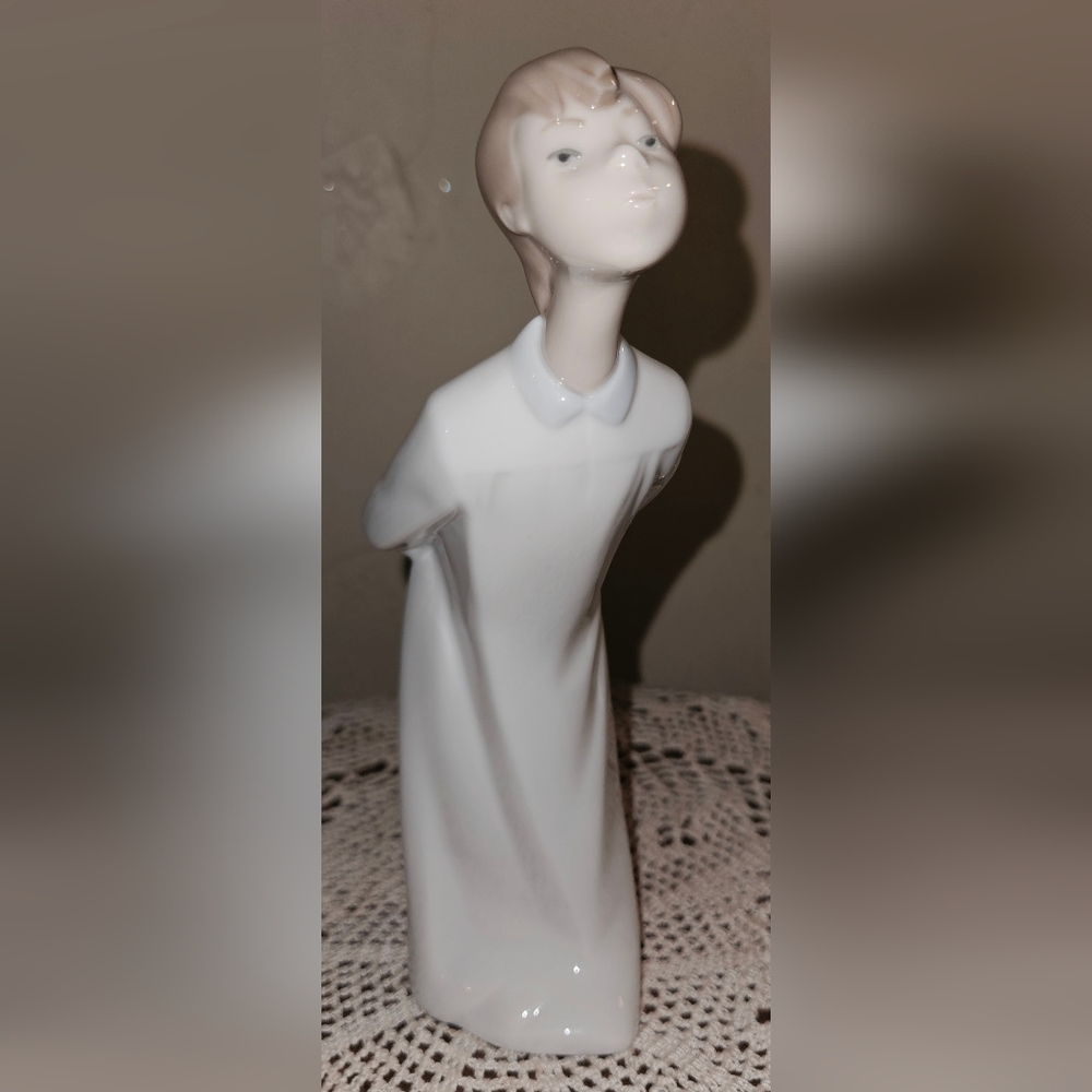 Lladro "Boy Blowing Kisses" or "Nino Soplando"